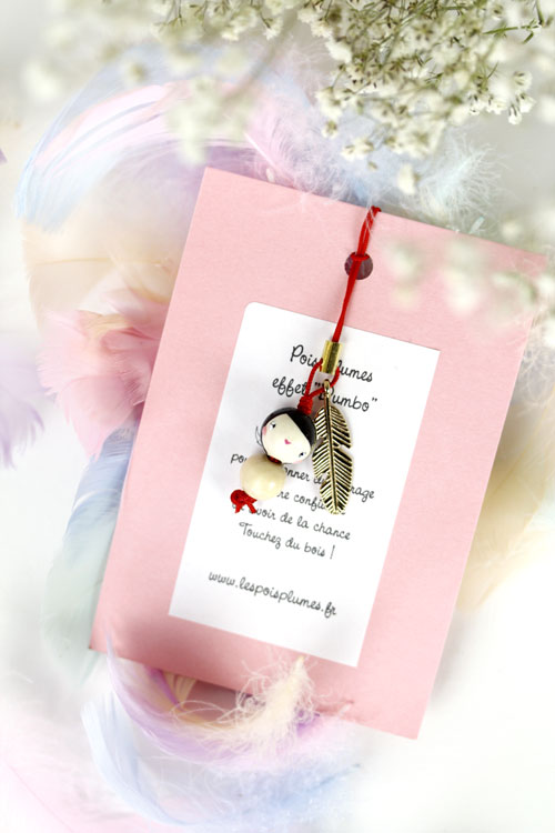 (image pour) Puce "Plume magique effet Dumbo"